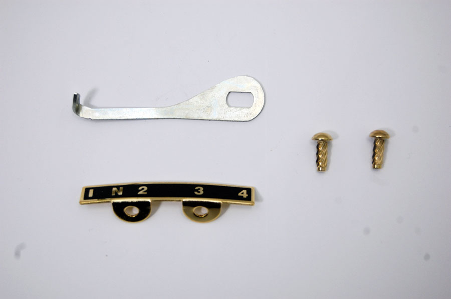 Pre unit gear indicator plate assembly with arms & rivets